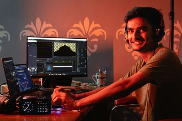 Indian professional working on a laptop